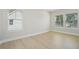 Bright, airy bedroom with large windows, perfect for relaxation and natural light at 2304 Depauw Ave, Orlando, FL 32804