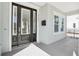 Modern entry with a black door, a mailbox, and neutral exterior at 2304 Depauw Ave, Orlando, FL 32804