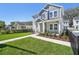 Well maintained lawn and sidewalk leading to a charming two-story home at 2304 Depauw Ave, Orlando, FL 32804
