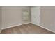 Bedroom featuring plush carpeting, a window with blinds, and a double door closet at 1604 Ellesmere Ave, Haines City, FL 33844