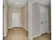 Spacious entryway featuring hardwood-style flooring, neutral walls, and ample natural light at 1604 Ellesmere Ave, Haines City, FL 33844