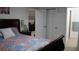 Comfortable bedroom with a large bed and view to the living room. Ideal for rest and relaxation at 17 Trotters Cir, Kissimmee, FL 34743