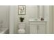 Well-lit bathroom with a modern vanity and a clean, simple design at 1799 Teagan Ln, Winter Haven, FL 33884