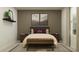 Relaxing bedroom featuring neutral tones, soft lighting, and decorative wall art at 1799 Teagan Ln, Winter Haven, FL 33884