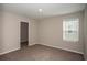 Bedroom with carpet flooring, neutral walls, and a closet for storage at 1905 Harrods Pl, Haines City, FL 33844