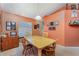 Dining room with bright-colored walls, a centered light fixture, and various decor and furniture at 3290 Big Valley Dr, Lakeland, FL 33812