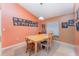 Cozy dining room with a large window, overhead lighting, and decor on the walls at 3290 Big Valley Dr, Lakeland, FL 33812