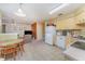 Open kitchen with tile flooring, views of the living room, and a dining area at 3290 Big Valley Dr, Lakeland, FL 33812