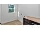 Bright laundry room showcasing butcher block countertop and dark cabinets, combining style and functionality at 7 Hill Prince Dr, Ocala, FL 34482