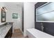 Gorgeous main bathroom with soaking tub, shower, and granite vanity at 7 Hill Prince Dr, Ocala, FL 34482