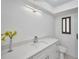 Bathroom featuring a modern vanity, sleek fixtures, and a minimalist design at 2310 Laguna Dr, Indian Lake Estates, FL 33855