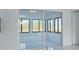 Sliding glass doors with backyard view at 2310 Laguna Dr, Indian Lake Estates, FL 33855