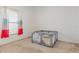 A bedroom featuring neutral carpet flooring and a window at 339 Magical Way, Kissimmee, FL 34744