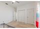 A bedroom featuring multiple closets and white walls at 339 Magical Way, Kissimmee, FL 34744