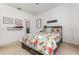 A bedroom featuring a large bed with a wooden bed frame at 339 Magical Way, Kissimmee, FL 34744