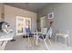 A patio area featuring an outdoor grill and furniture at 339 Magical Way, Kissimmee, FL 34744