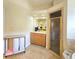 Bright bathroom with a shower, light wood cabinetry, and tile floors at 5685 Lake Victoria Dr, Lakeland, FL 33813
