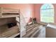 bedroom featuring a bunk bed, built-in ladder, and a window that offers natural light at 5685 Lake Victoria Dr, Lakeland, FL 33813