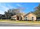 Charming single-Gathering home with well-manicured landscaping and a two-car garage at 5685 Lake Victoria Dr, Lakeland, FL 33813