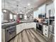 Modern kitchen featuring stainless steel appliances, subway tile backsplash, and ample counter space at 5685 Lake Victoria Dr, Lakeland, FL 33813