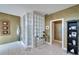 Bathroom featuring a glass block shower, tile floor, neutral paint, and vanity area at 616 Peninsular Dr, Lakeland, FL 33813