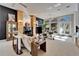 Spacious living room with fireplace, large windows, modern decor, and scenic outdoor views at 616 Peninsular Dr, Lakeland, FL 33813