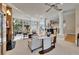 Bright and airy living room with floor to ceiling windows, columns, and an open floor plan at 616 Peninsular Dr, Lakeland, FL 33813