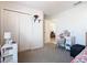 Cozy bedroom featuring plush carpet, closet and vanity area at 456 Hilltop Dr, Lake Wales, FL 33853