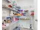 Walk-in pantry with wire shelving, offering ample storage space for groceries and household items at 456 Hilltop Dr, Lake Wales, FL 33853