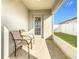 Enclosed patio with chairs and view of backyard at 456 Hilltop Dr, Lake Wales, FL 33853
