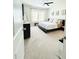 Inviting bedroom with neutral tones, soft carpet, and plenty of natural light at 648 Bloom Ter, Davenport, FL 33836