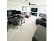 Upstairs bonus room with lots of seating and gaming setup at 648 Bloom Ter, Davenport, FL 33836