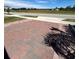 Paver driveway showcases the home's curb appeal and provides ample parking space at 648 Bloom Ter, Davenport, FL 33836