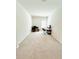 Spacious office with neutral walls, carpet flooring, and a window for natural light at 648 Bloom Ter, Davenport, FL 33836