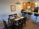 Inviting dining area adjacent to the kitchen, perfect for Gathering meals and entertaining guests at 705 Gran Bahama Blvd # 705, Davenport, FL 33897
