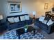 Comfortable living room with coordinated furniture and a decorative rug, ideal for relaxation and gatherings at 705 Gran Bahama Blvd # 705, Davenport, FL 33897