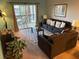 The living room features a balcony that offers an abundance of natural light at 705 Gran Bahama Blvd # 705, Davenport, FL 33897