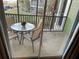 Relaxing outdoor patio with table and chairs perfect for enjoying the view at 705 Gran Bahama Blvd # 705, Davenport, FL 33897
