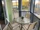 Screened in patio with outdoor table and chairs at 705 Gran Bahama Blvd # 705, Davenport, FL 33897