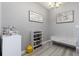 Flex space with neutral paint, decor, and light-colored laminate flooring, perfect for a bedroom at 380 Arbor Lakes Dr, Davenport, FL 33896