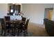 Dining room featuring a wood table and chairs, as well as a decorative rug at 512 Central Ridge Ln, Frostproof, FL 33843