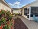 Backyard featuring a brick-paved patio area at 992 Davit Pl, The Villages, FL 32162