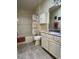 Bathroom featuring a shower and tub, a toilet, sink and white vanity at 992 Davit Pl, The Villages, FL 32162