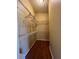 Walk-in closet with ample shelving and storage space, perfect for organization at 992 Davit Pl, The Villages, FL 32162