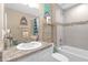 Bathroom with decorative backsplash, built in shelving, vanity with ample counter space and sink at 1426 Powhatan Ct, Lakeland, FL 33805