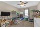 bedroom features bunk beds, a ceiling fan, and a bright window for natural light at 1426 Powhatan Ct, Lakeland, FL 33805