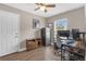 Office with wood floors, ample natural light, neutral walls, and door to the exterior at 1426 Powhatan Ct, Lakeland, FL 33805