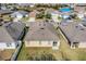 This aerial shows the property's backyard, highlighting its generous size and well-maintained lawn at 3214 Bayou Bay Dr, Lakeland, FL 33811