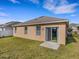 Exterior view of home with a patio at 3214 Bayou Bay Dr, Lakeland, FL 33811