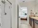 Bathroom showcases shower with glass door and neutral-toned vanity at 3214 Bayou Bay Dr, Lakeland, FL 33811
